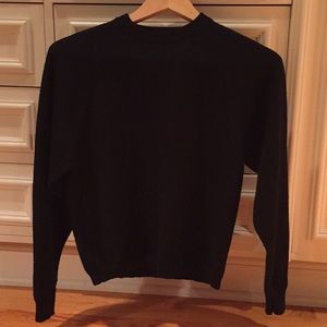 Women’s petite black sweater.
